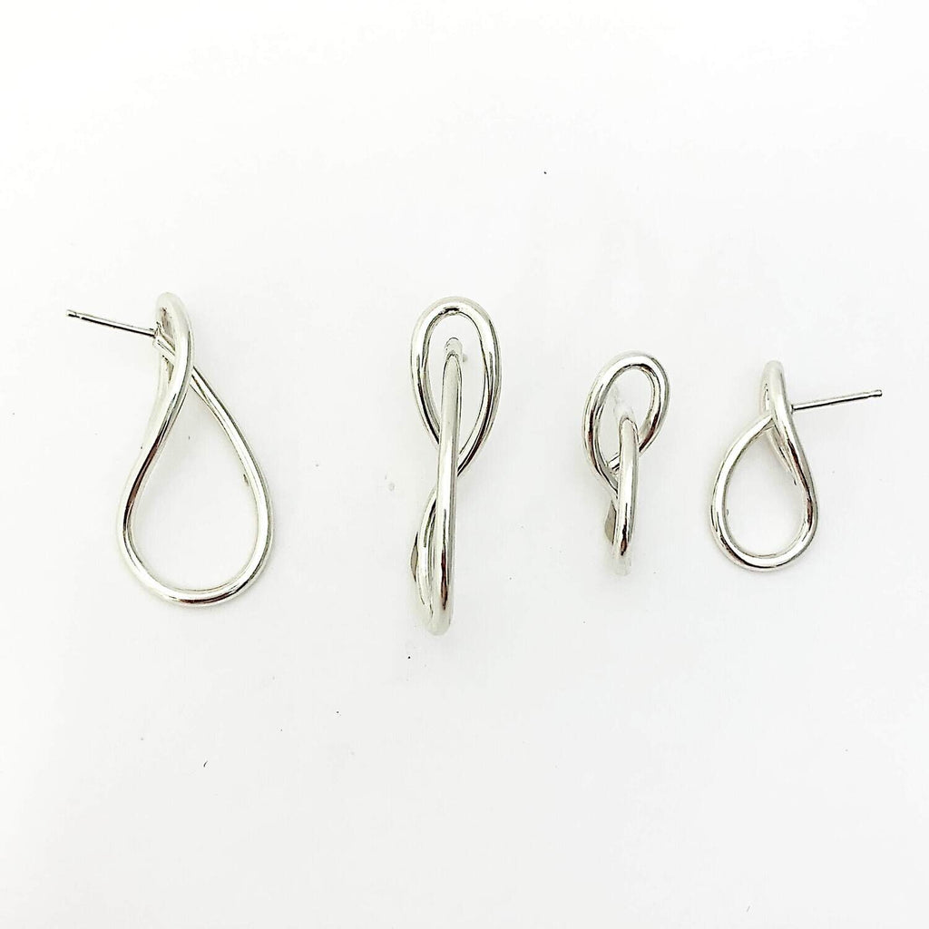 Two sizes of Sterling silver Simplicity earrings, handcrafted by Lynda Constantine, made in Canada
