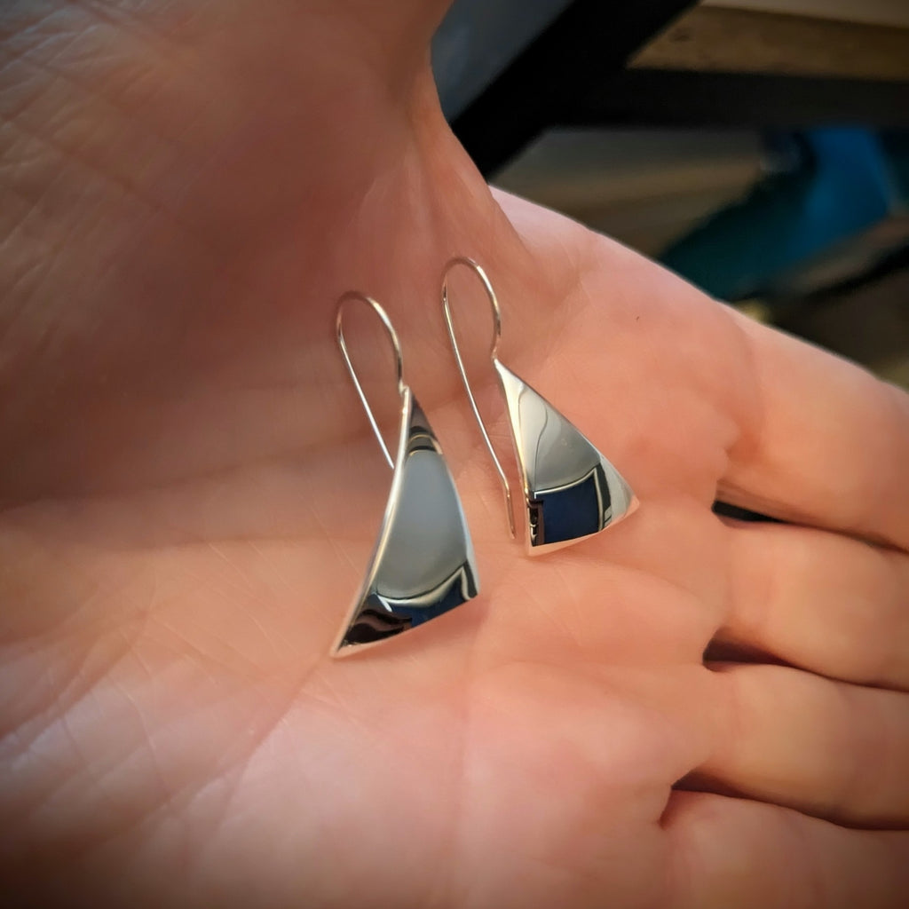 scale shot of Sterling Silver Sail Drop Earrings by Lynda Constantine