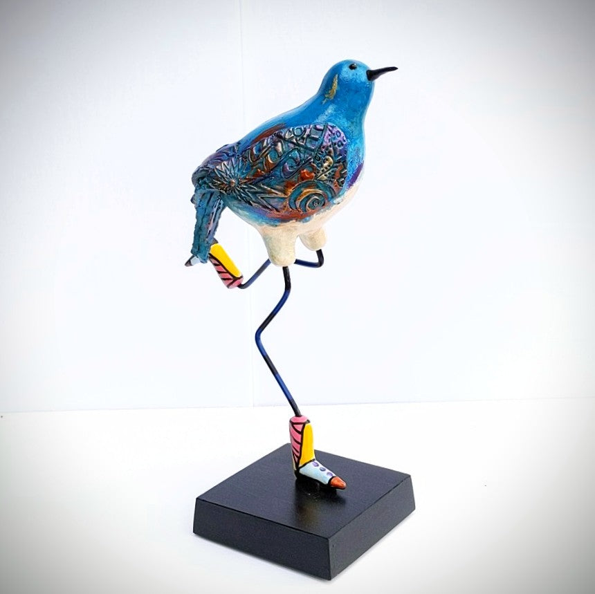 Bird with cowboy boots, ceramic sculpture by Steven  McGovney