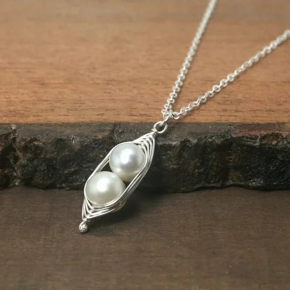 White Pearl Peas-in-a-pod pendant by Rising Jewelry, formerly Lucky Accessories