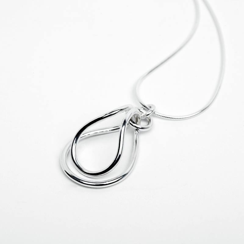 Handcrafted sterling silver pendant on silver snake chain, made by Lynda Constantine