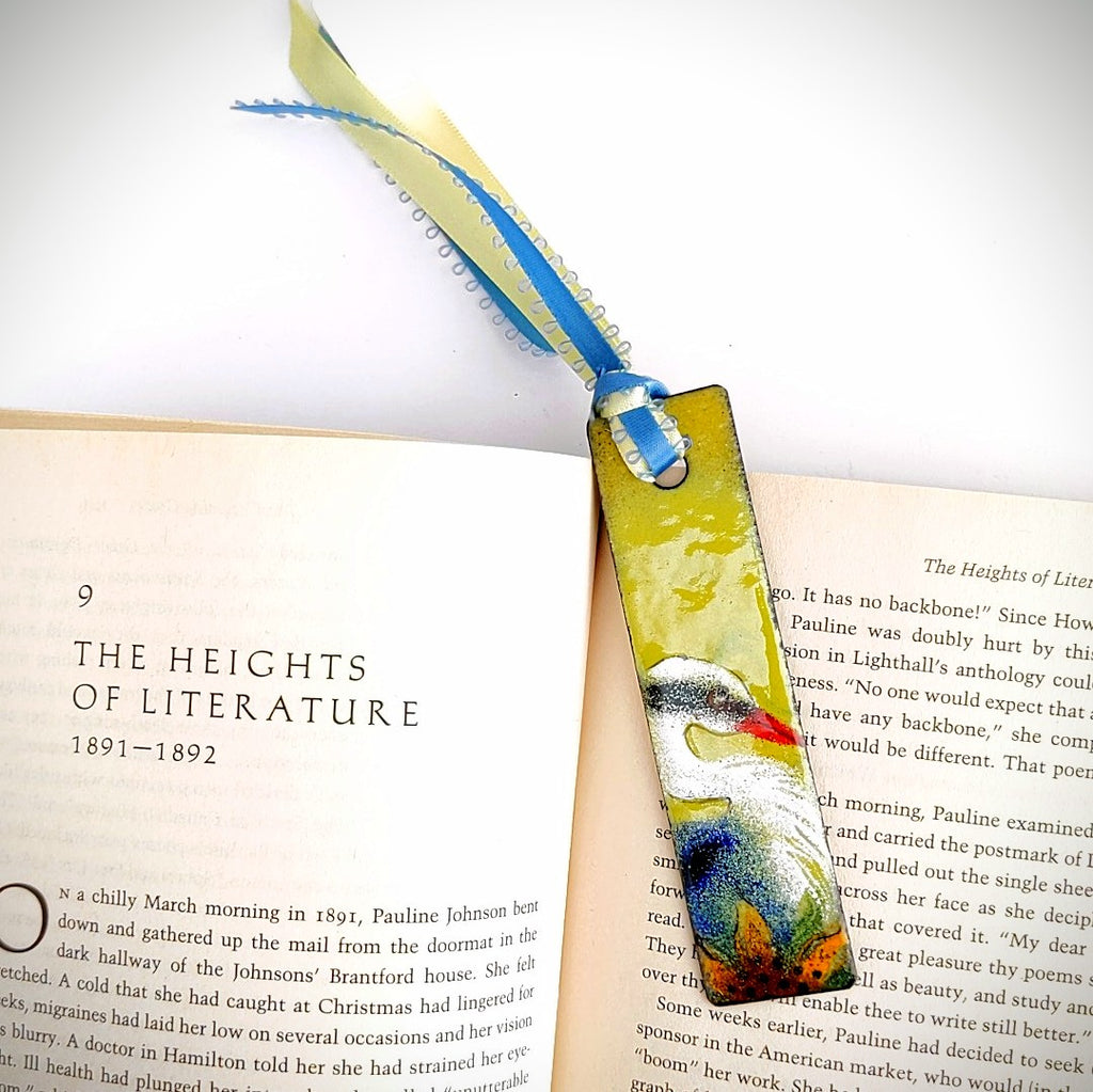 Heron design enamel bookmark by Margot Page,  lifestyle view