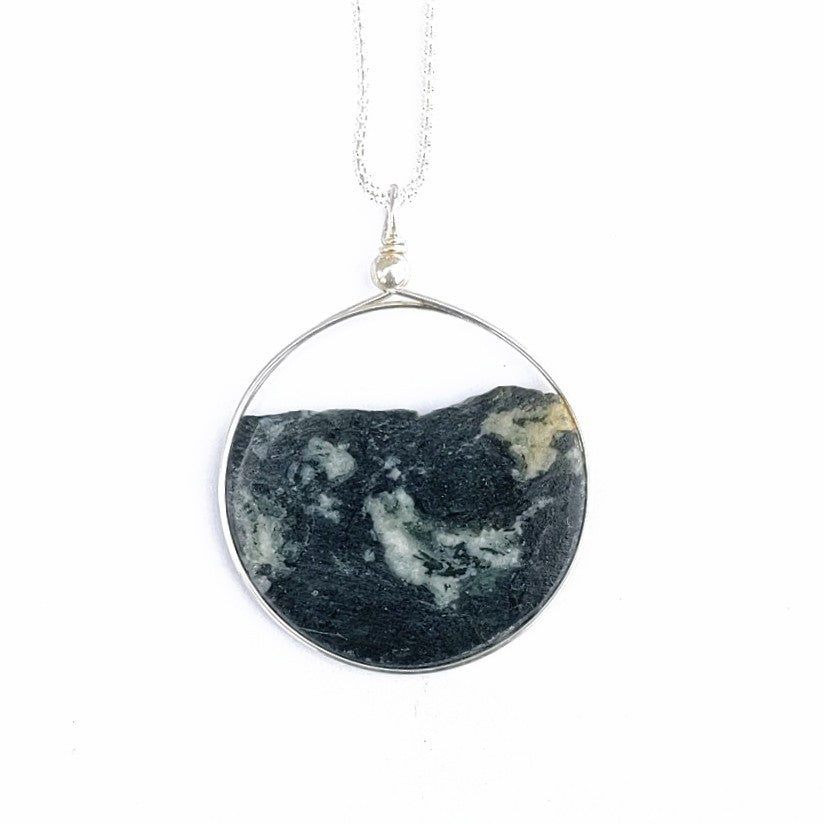 A thin slice of solid rock makes up this pendant, created by Wendy Stanwick of A Slice of the North Jewellery, back view