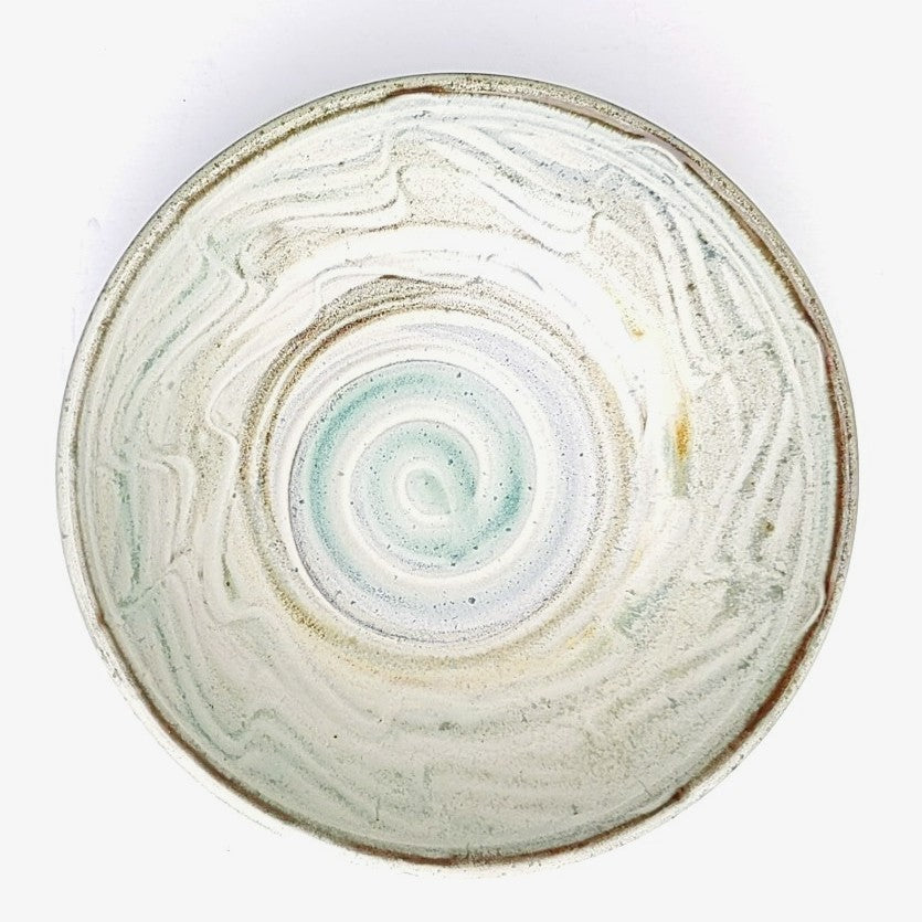 Large wheel-thrown pottery bowl by Wayne Cardinalli, swirl glaze detail