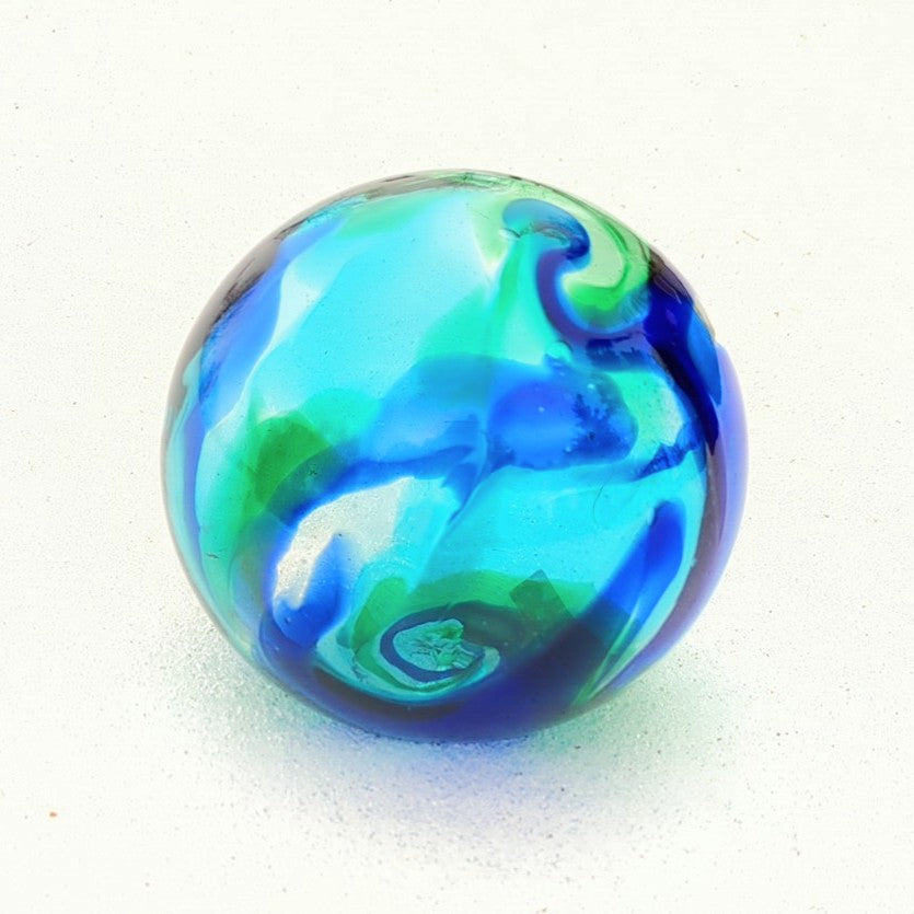 Another view of Glass float, white hand-blown glass ball, flat fisherman's float