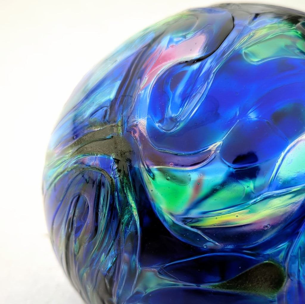 detail of Glass float, white hand-blown glass ball, flat fisherman's float