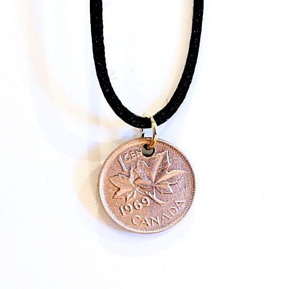 Canadian copper penny used as backing for enamel pendant by Margot Page