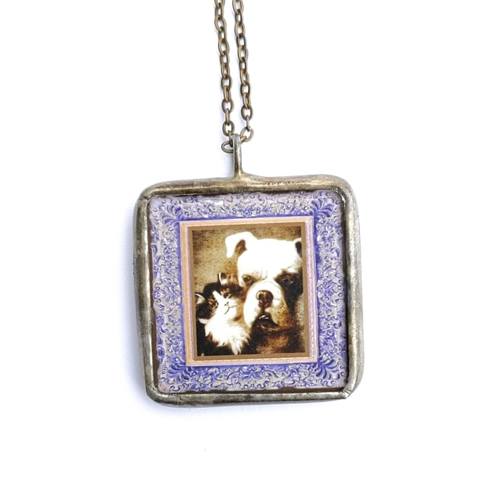 Cat and Dog reversible pendant by Nettles Jewelry