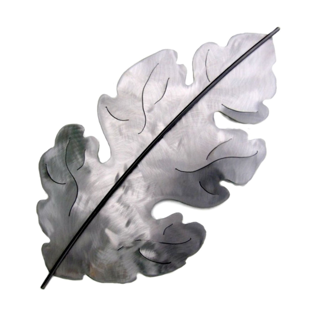Shiny steel Oak Leaf, slightly coved to create space from the wall, handcrafted metal wall  art by Metallic Evolution.