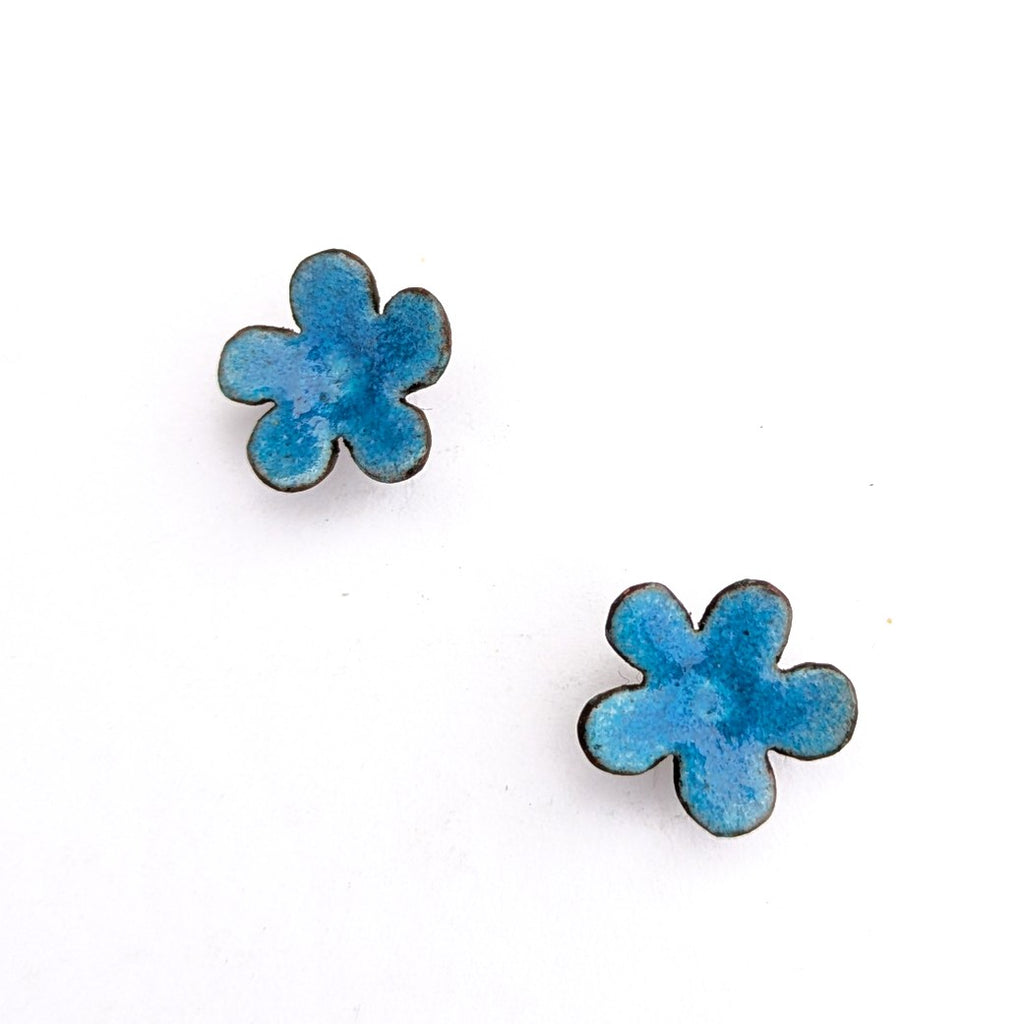 Blue enamel flower stud earrings by Timothy Laurin, handmade in Canada.