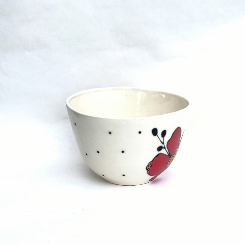 Flower design handmade pottery bowl by Juliet Promnitz side, white background