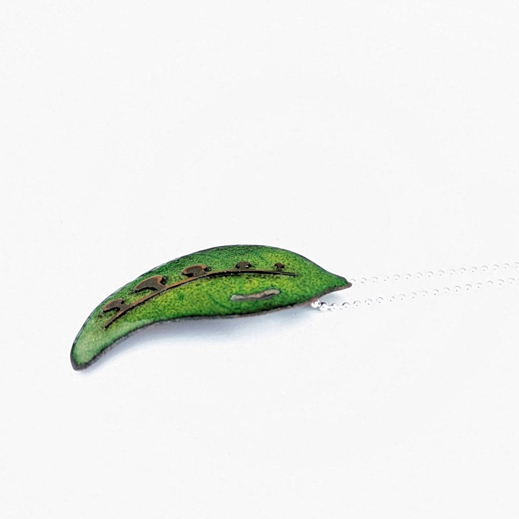 side view of Green enamel leaf pendant, made in Canada by Tim Laurin