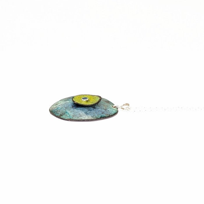 side view of Domed enamel pendant with layers, by Canadian artisan Timothy Laurin.