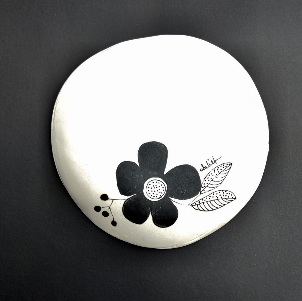 back view ofOne of a kind black and white designer plate by Juliet Promnitz