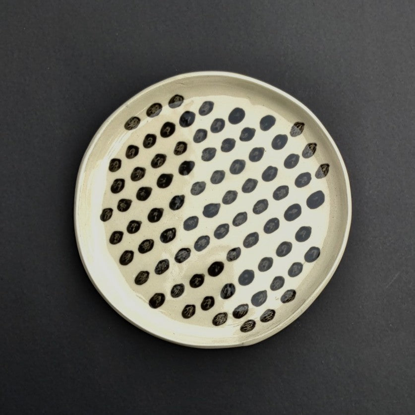 Dotted pattern hand built white clay plate by Juliet Promnitz