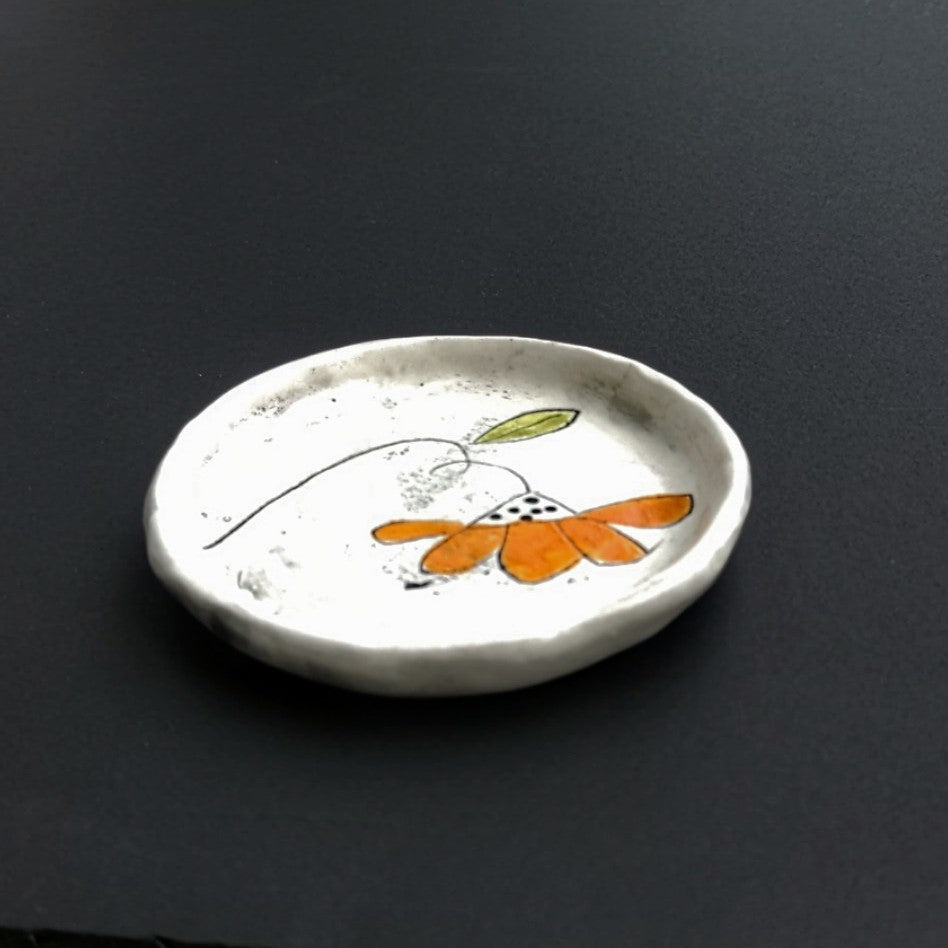 Ring Dish, hand formed white clay by Juliet Promnitz, black background