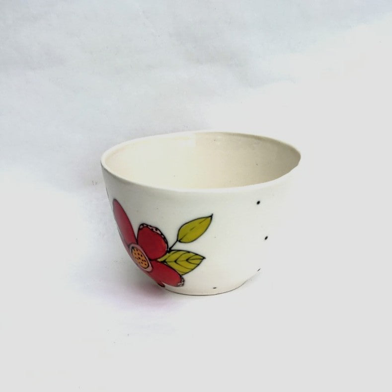 Flower design handmade pottery bowl by Juliet Promnitz white pottery glaze