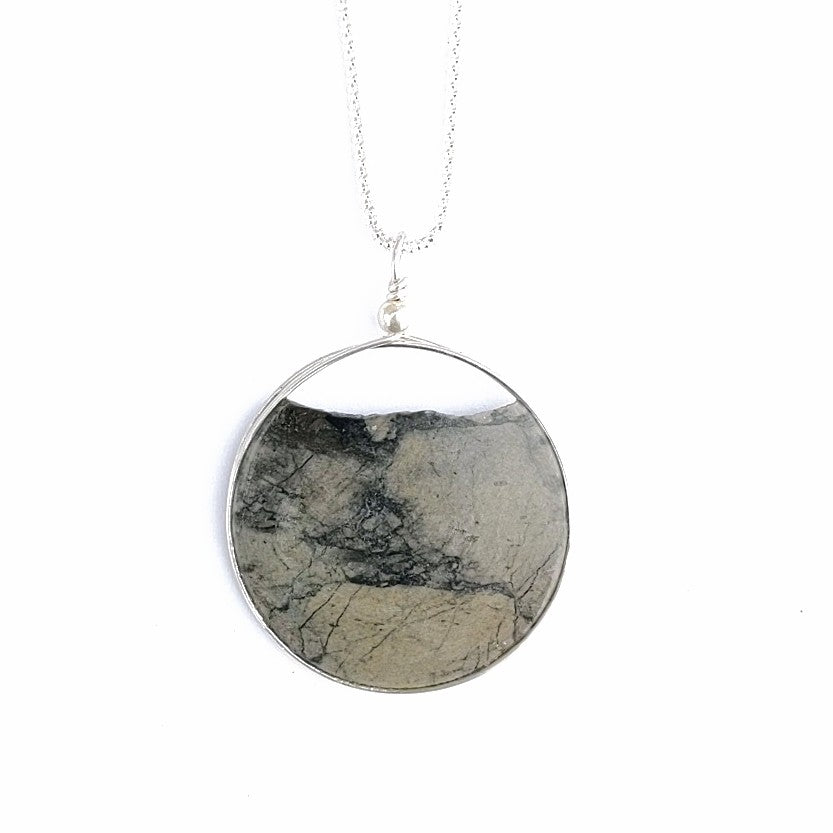 back view of Solid stone, hand painted design, sterling silver chain, pendant made in Canada by Wendy Stanwick of A Slice of the North jewellery.