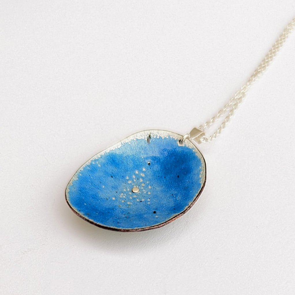 back view of Floral domed pendant in enamel by Timothy Laurin, made in Canada