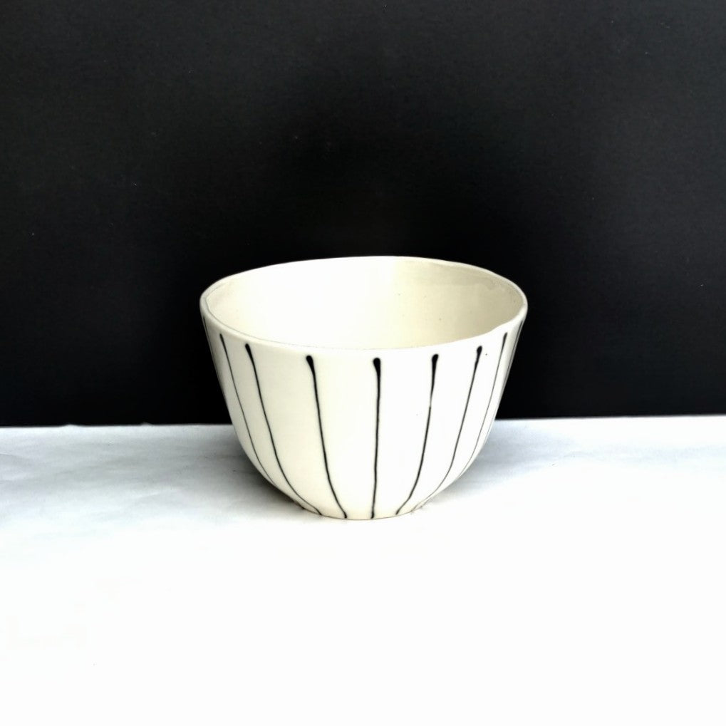 Striped white clay bowl, pottery by Juliet Promnitz