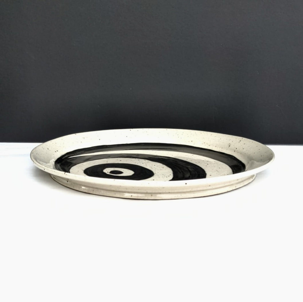 bold graphic hand built pottery plate by Juliet Promnitz