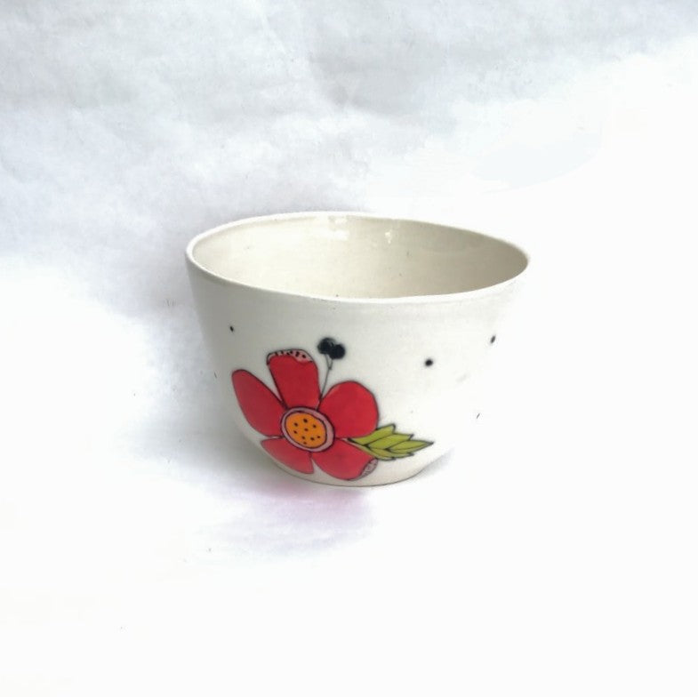 Flower design handmade pottery bowl by Juliet Promnitz white background