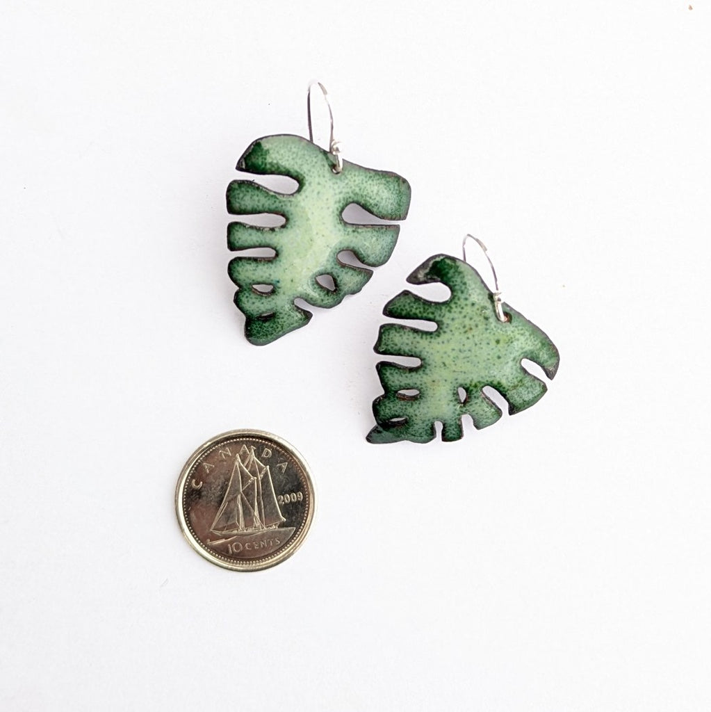 Leaf-shaped enamel earrings, made in Canada by Timothy Laurin showing actual size