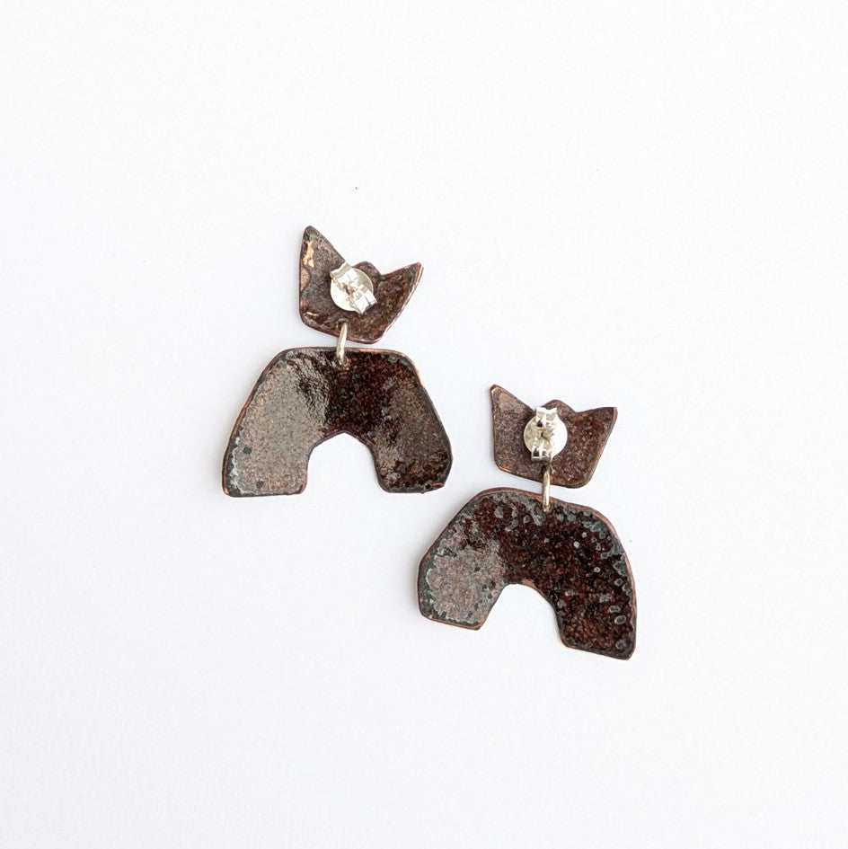 back side of A mini-crown, abstract enamel earring, handmade in Canada by Timothy Laurin