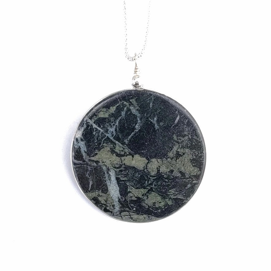Solid Granite disc, painted northern trees, freshwater pearl, sterling silver chain, pendant by Wendy Stanwick, A Slice of the North jewellery., back view.
