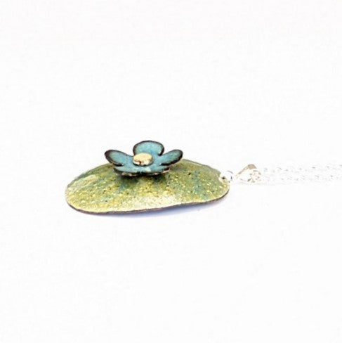 side view of Floral domed pendant in enamel by Timothy Laurin, made in Canada