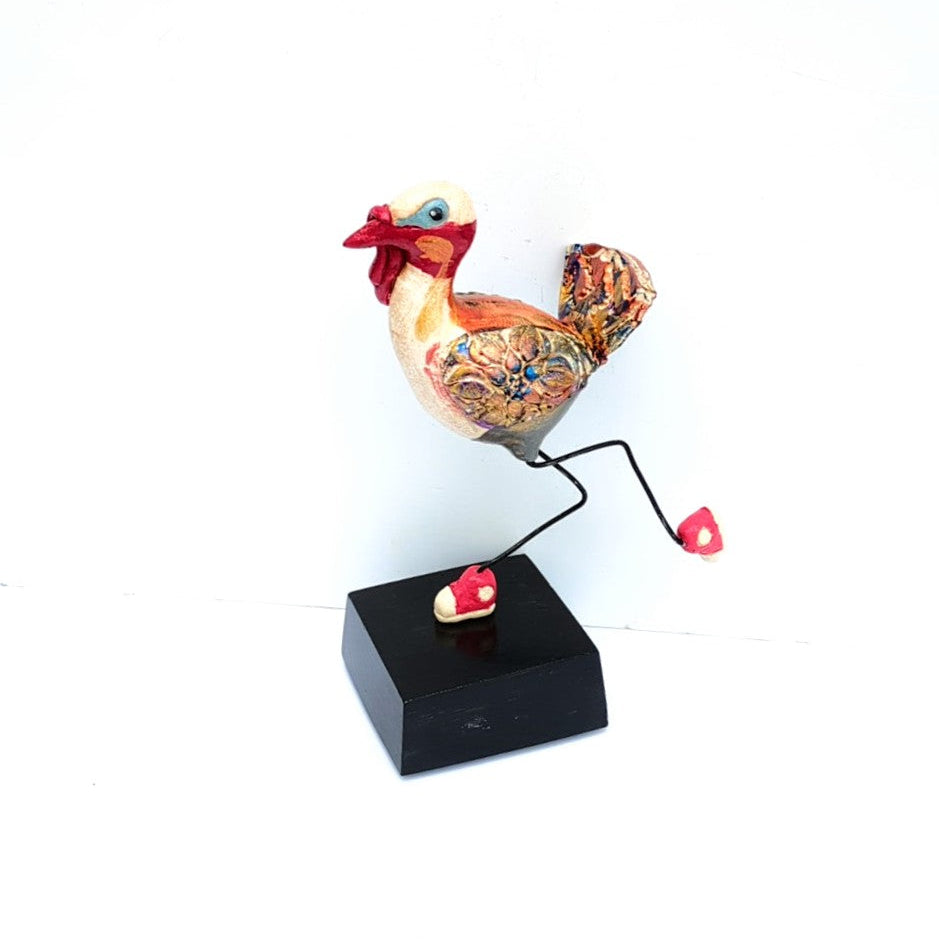 Decorative Turkey figurine with tennis shoes, on a solid base, ceramic sculpture by Steven McGovney