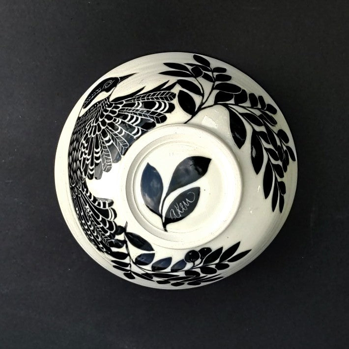 Bottom of White clay with black carved design, pottery bowl by Amanda Kerr, bird motif