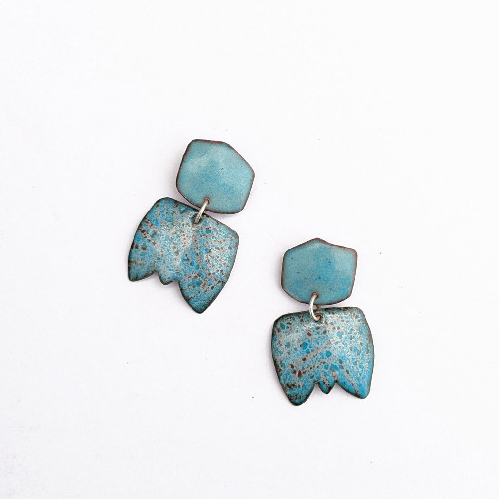 Abstract dangle earring handcrafted by Timothy Laurin.  Blue speckled enamal earring