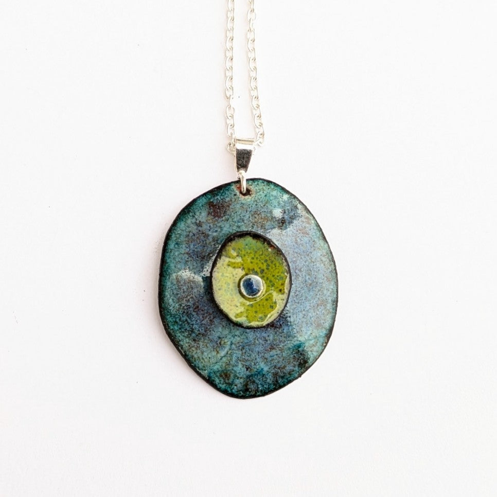 Domed enamel pendant with layers, by Canadian artisan Timothy Laurin.