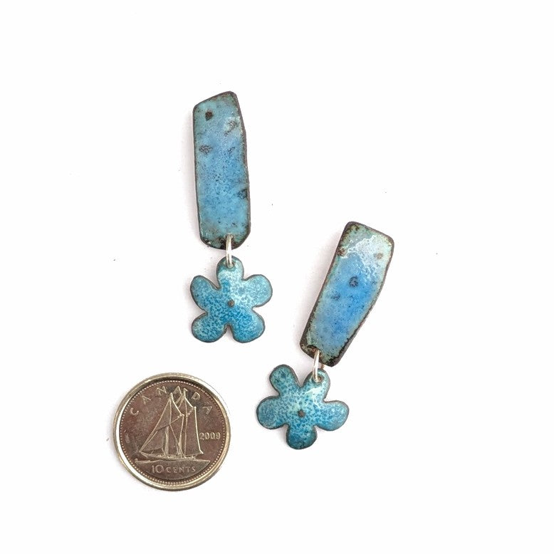 Hand applied blue enamel finish on these dangle earrings by Canadian Timothy Laurin, shown here actual size