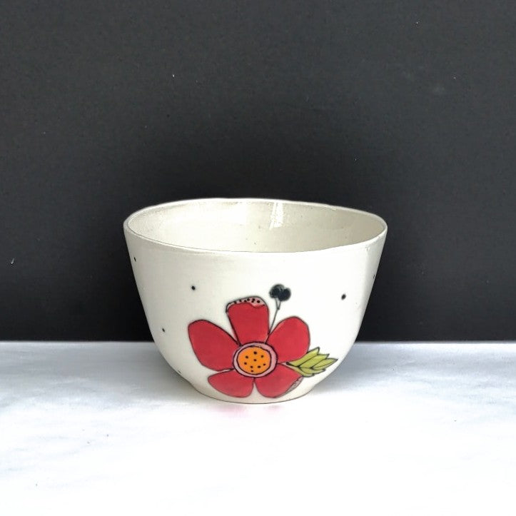 Flower design handmade pottery bowl by Juliet Promnitz front view