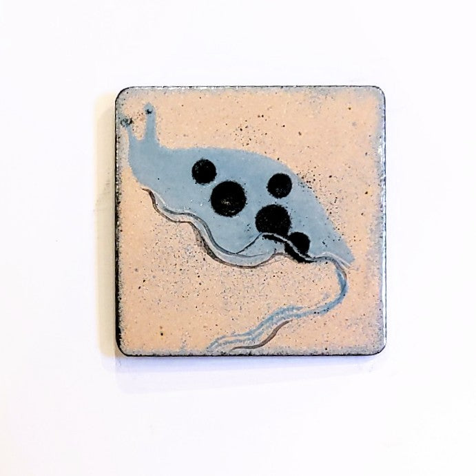 Enamel fridge magnet by Margot Page,  slug design