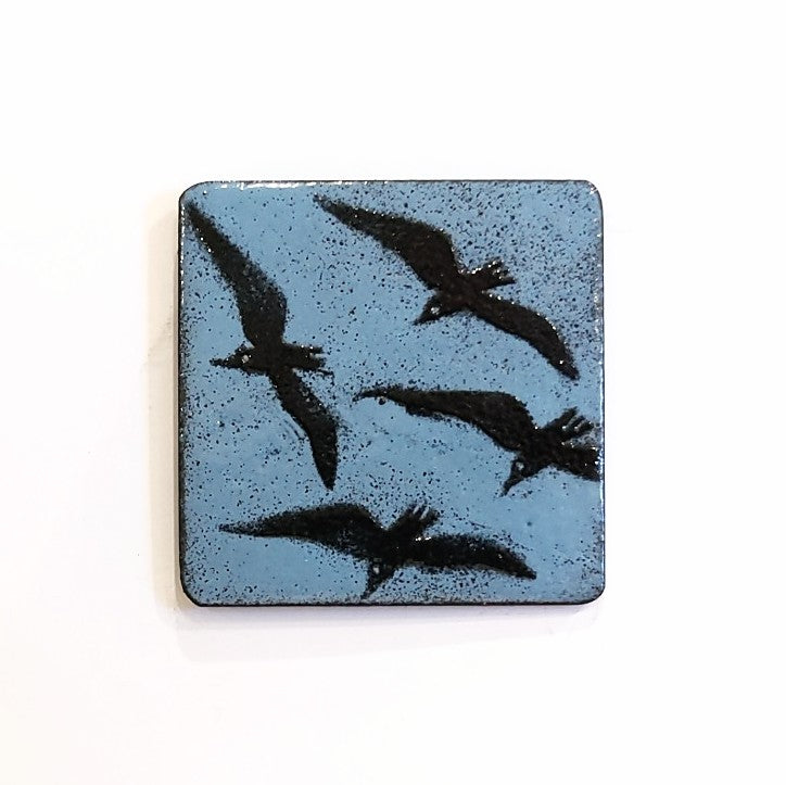 Enamel fridge magnet by Margot Page,  flock of crows