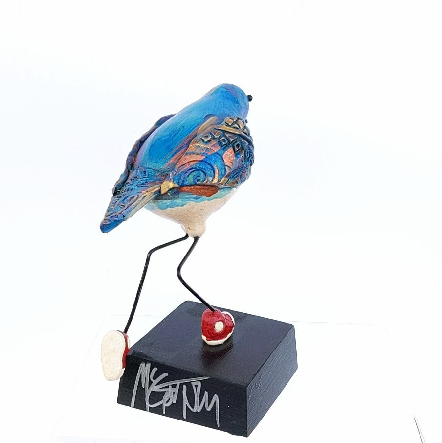 Baby Blue Bird with sneakers, ceramic sculpture by Steven  McGovney, back view