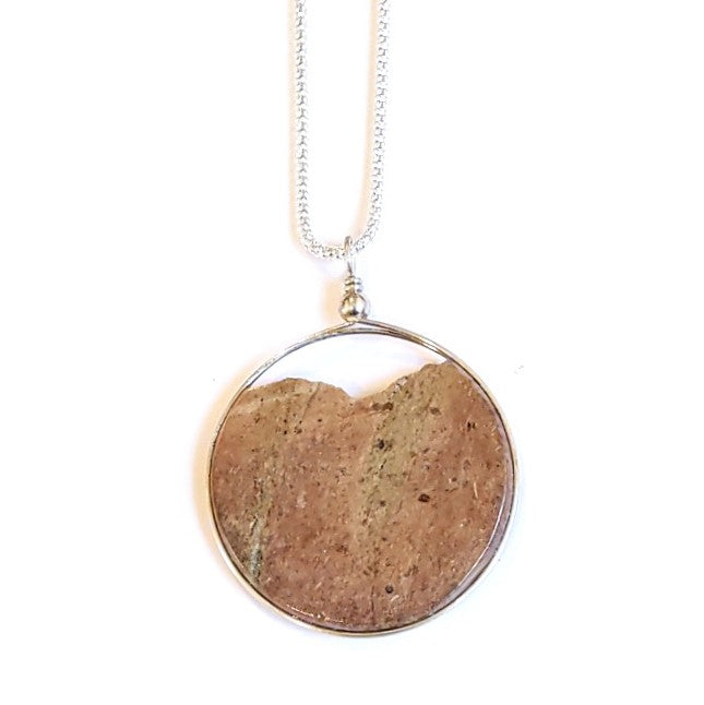 Unpainted side of Solid stone slice, Canadian made pendant by Wendy Stanwick of A Slice of the North jewellery.