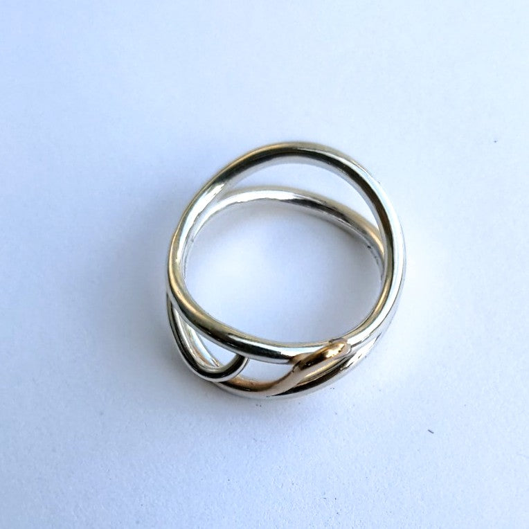 Top view of Flame ring in sterling silver and 14 karat gold, handcrafted in Canada by Lynda Constantine