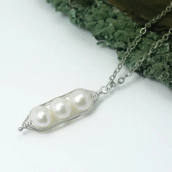 White Pearl Peas-in-a-pod pendant by Rising Jewelry, formerly Lucky Accessories